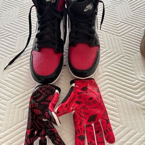 Air Jordan Black/Red Football cleats with red & black matching football gloves.